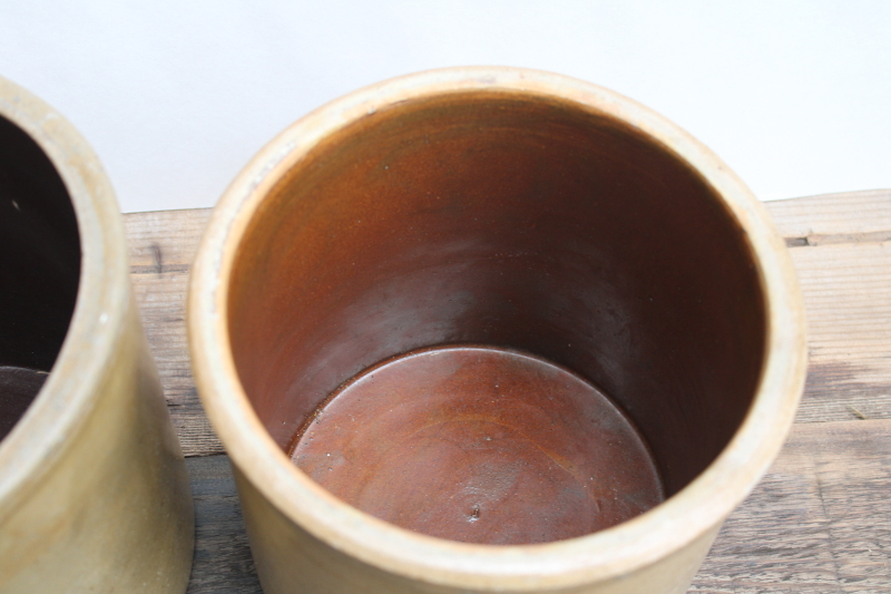 photo of two old worn browned stoneware crocks, large planter pots for trees or greenery, farmhouse kitchen storage  #3