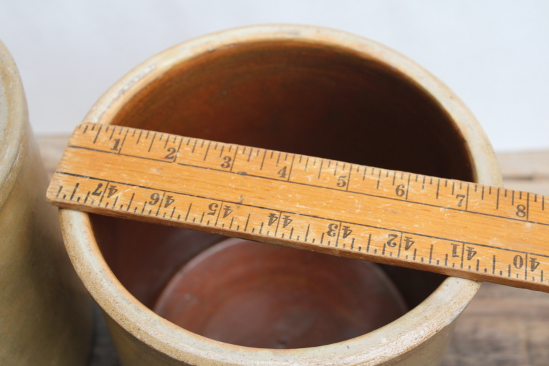 photo of two old worn browned stoneware crocks, large planter pots for trees or greenery, farmhouse kitchen storage  #5
