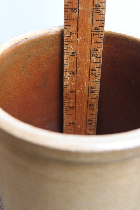 photo of two old worn browned stoneware crocks, large planter pots for trees or greenery, farmhouse kitchen storage  #9