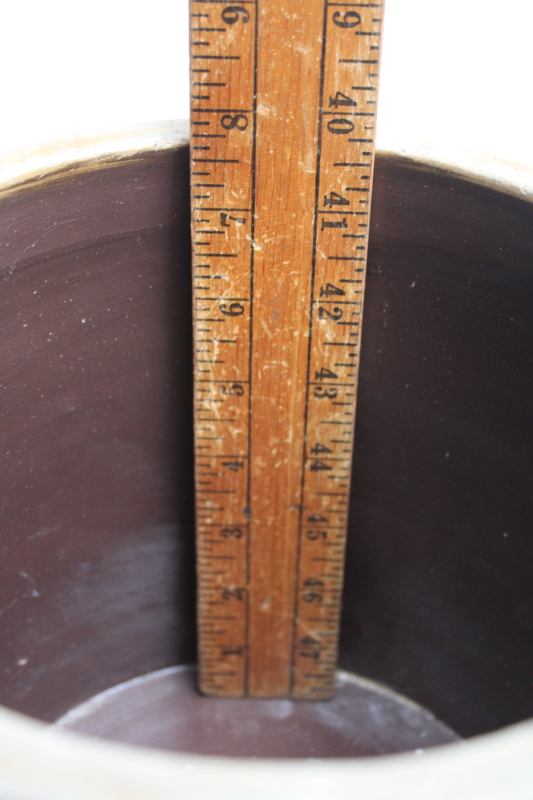 photo of two old worn browned stoneware crocks, large planter pots for trees or greenery, farmhouse kitchen storage  #10