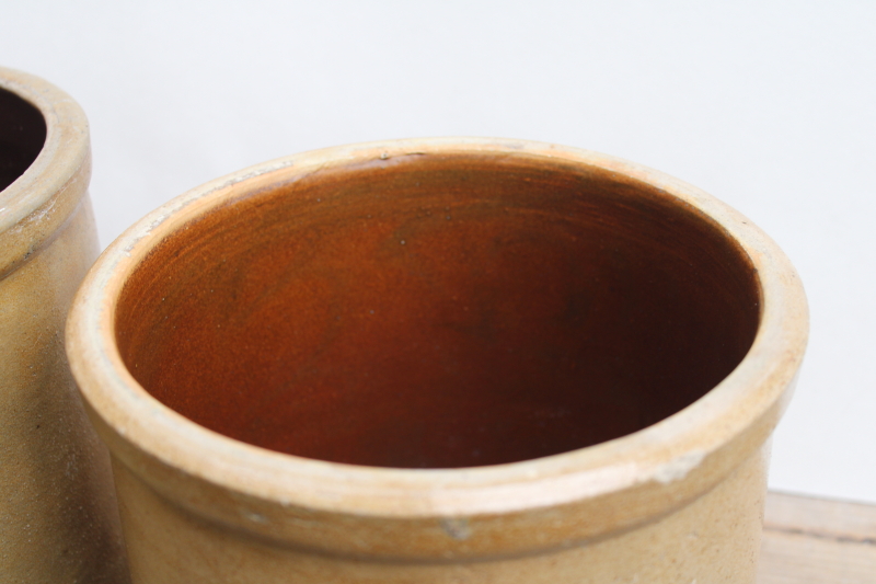 photo of two old worn browned stoneware crocks, large planter pots for trees or greenery, farmhouse kitchen storage  #18