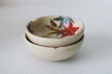 catalog photo of two tiny old tea bowls or sauce dishes, wabi sabi crazed worn hand painted Japan ceramic 