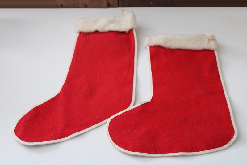 photo of two vintage Christmas stockings, 1950s dime store decorations red cotton w/ furry trim  #1