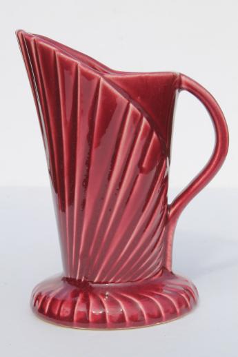 photo of unmarked 40s vintage pottery pitcher, art deco stylized fan shape, burgundy maroon glaze #1