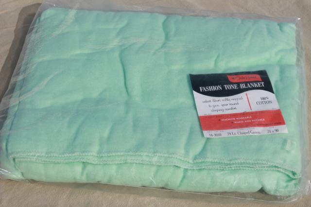 photo of unused vintage 100% cotton sheet blanket, light green mint color, Montgomery Wards Style House label #1