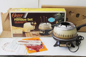 catalog photo of unused vintage Oster electric fondue pot w/ manual, complete set in box