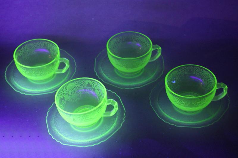 photo of uranium glow green depression glass tea cups and saucers 1930s vintage Hazel Atlas glassware #1