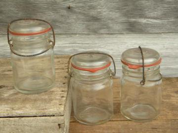 catalog photo of vintage 1 pt glass storage jars or canisters w/glass lids, lot of 3