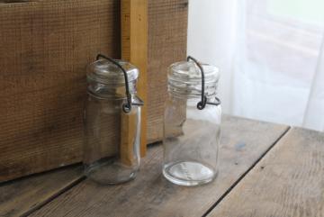catalog photo of vintage 1970s Wheaton glass mason jar style bottles, large spice jars w/ wire bail lids