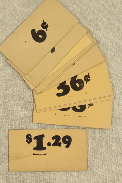 photo of vintage 5 & 10 cent five and dime variety store price tag signs stencil numbers graphics #1