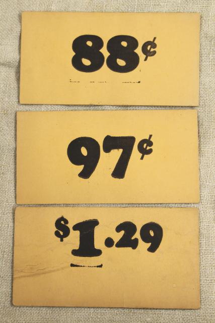 photo of vintage 5 & 10 cent five and dime variety store price tag signs stencil numbers graphics #6