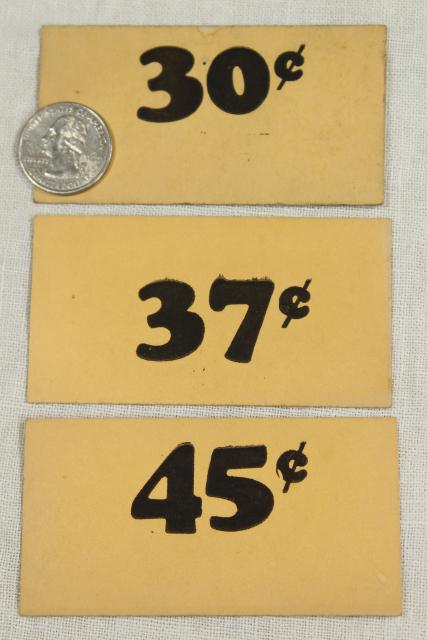 photo of vintage 5 & 10 cent five and dime variety store price tag signs stencil numbers graphics #4