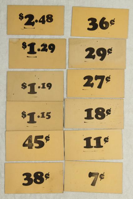 photo of vintage 5 & 10 cent five and dime variety store price tag signs stencil numbers graphics #1