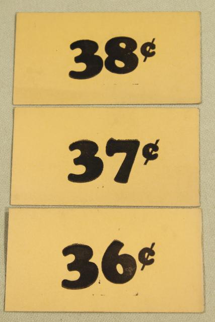 photo of vintage 5 & 10 cent five and dime variety store price tag signs stencil numbers graphics #5