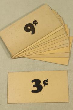 photo of vintage 5 & 10 cent five and dime variety store price tag signs stencil numbers graphics