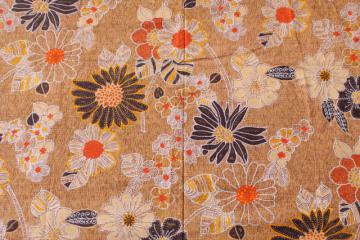 catalog photo of vintage 70s batik look Hawaiian print cotton fabric, warm earth tone colors