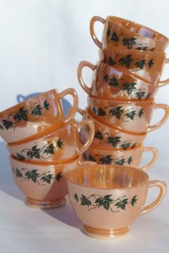 catalog photo of vintage Anchor Hocking Fire King peach luster copper tint punch cups w/ black ivy leaves