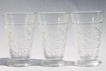 catalog photo of vintage Anchor Hocking clear sandwich glass daisy flower footed tumblers