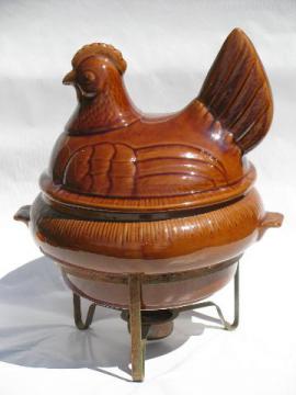 catalog photo of vintage California pottery hen on nest casserole w/copper warming stand