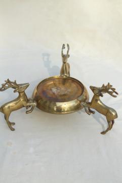 catalog photo of vintage Christmas brass reindeer pot stand for tabletop tree or vase, leaping deer