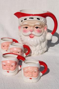 catalog photo of vintage Christmas ceramic Santa face mini mugs & large head vase pitcher Santa Claus