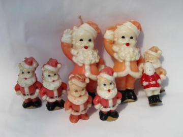 catalog photo of vintage Christmas holiday candles, lot of figural Santas