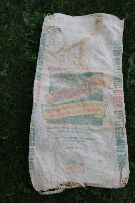 photo of vintage Dekalb advertising seed corn sacks, worn faded farm primitives, printed cotton grain bags  #4