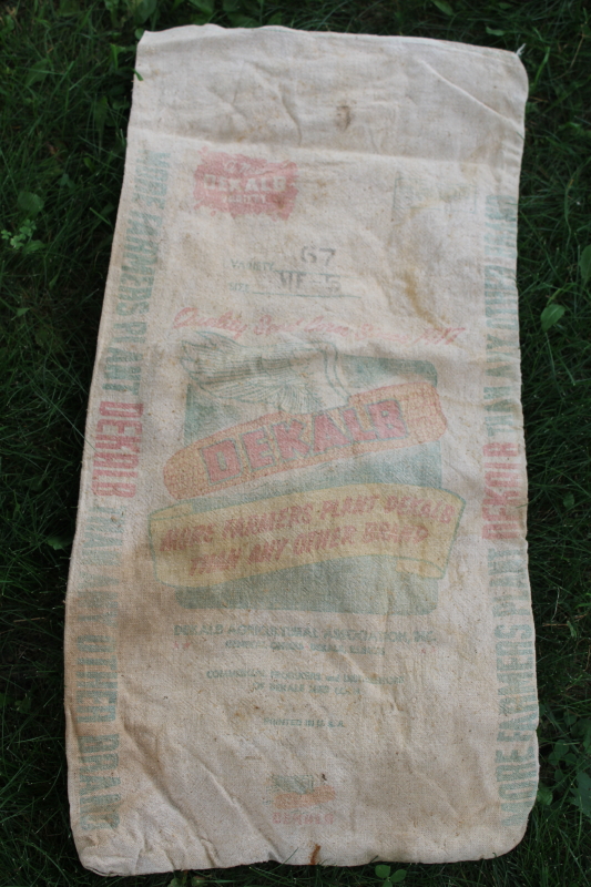 photo of vintage Dekalb advertising seed corn sacks, worn faded farm primitives, printed cotton grain bags  #6