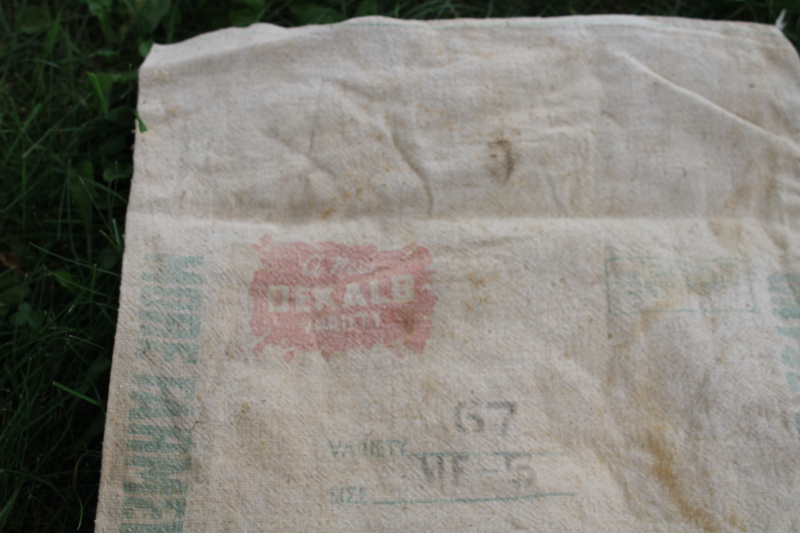 photo of vintage Dekalb advertising seed corn sacks, worn faded farm primitives, printed cotton grain bags  #7
