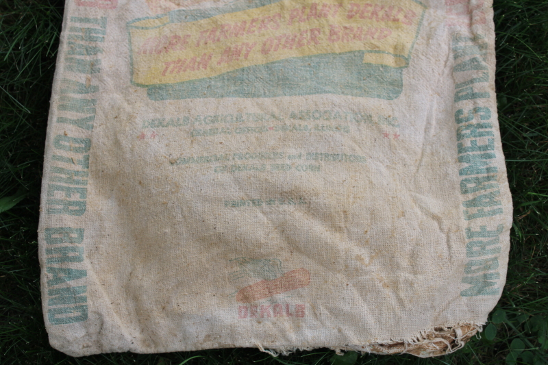 photo of vintage Dekalb advertising seed corn sacks, worn faded farm primitives, printed cotton grain bags  #11