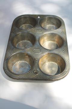 catalog photo of vintage Ekco Ovenex starburst pattern textured metal muffin or cupcake pan