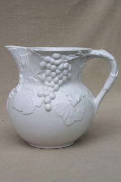 catalog photo of vintage Elios Italian earthenware ceramic pitcher, glossy pure white w/ clusters of grapes