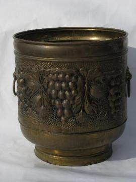 catalog photo of vintage English embossed brass garden hose holder or large jardiniere planter