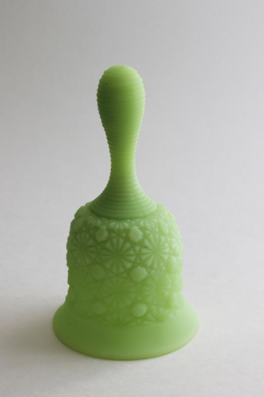 photo of vintage Fenton bell, lime green satin frosted glass daisy & button pattern #1