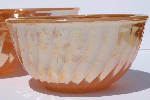 photo of vintage Fire-King peach luster glass mixing bowl nest, nesting swirl bowls #8