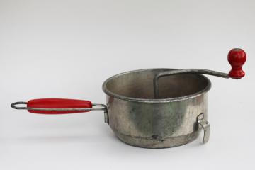 catalog photo of vintage Foley food mill w/ red painted wood handles, hand crank kitchen strainer