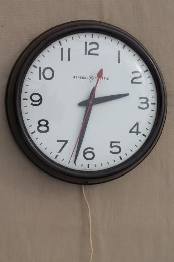 photo of vintage GE electric wall clock, big brown bakelite school clock or industrial office clock #1