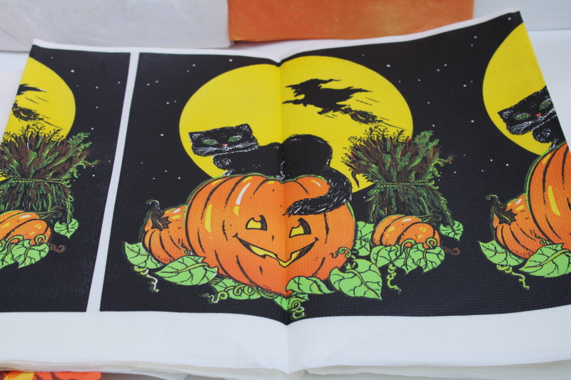 photo of vintage Halloween party tablecloths, orange crepe paper w/ black cat, white paper table covers w/ print borders #6