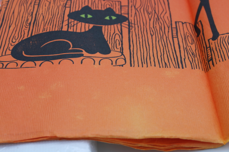 photo of vintage Halloween party tablecloths, orange crepe paper w/ black cat, white paper table covers w/ print borders #11