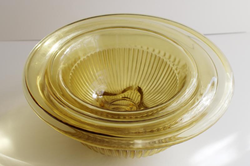 photo of vintage Hazel Atlas glass nest of mixing bowls, amber yellow depression glass #3