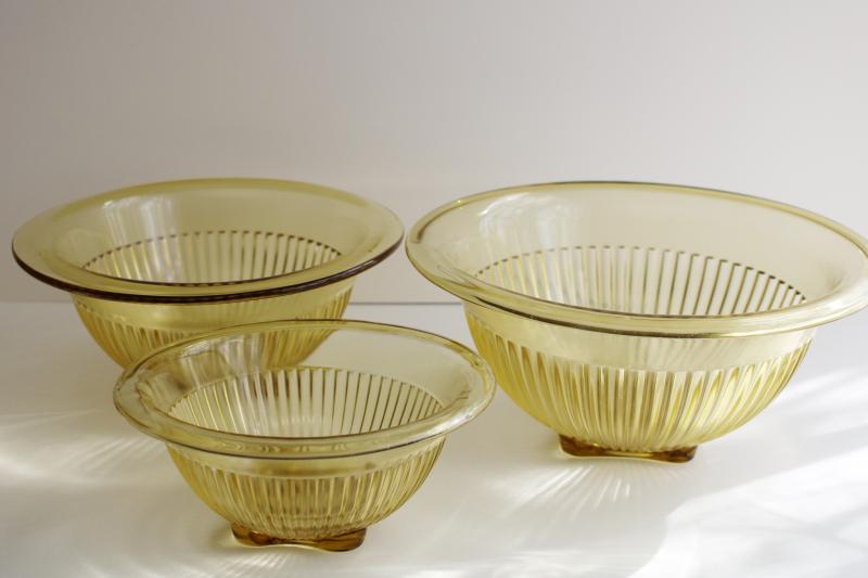 photo of vintage Hazel Atlas glass nest of mixing bowls, amber yellow depression glass #5