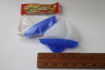 catalog photo of vintage Hong Kong toy novelty plastic sailboat, sealed original dime store package w/ header 