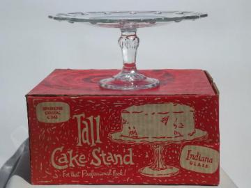 catalog photo of vintage Indiana glass cake stand in original red and white box 