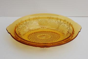 catalog photo of vintage Indiana glass daisy pattern oval bowl, dark amber depression glass