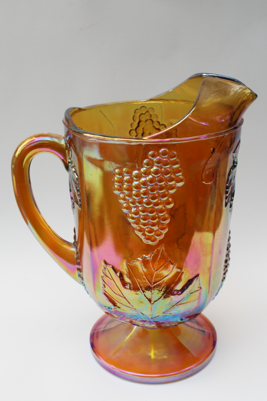 photo of vintage Indiana glass marigold amber gold carnival glass pitcher, grapes pattern #1