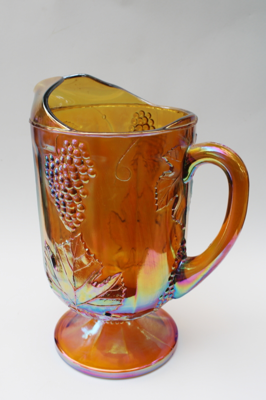 photo of vintage Indiana glass marigold amber gold carnival glass pitcher, grapes pattern #2