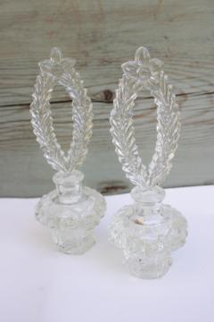 catalog photo of vintage Irice pressed glass perfume bottles w/ tall fancy stoppers, vanity bottle pair