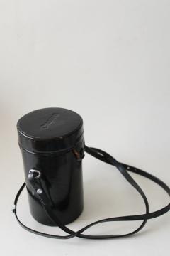 photo of vintage Japan Canon camera lens case, worn black leather w/ shoulder bag strap