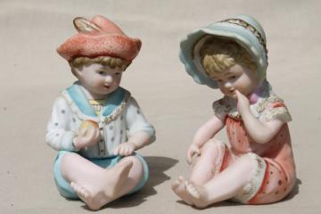 catalog photo of vintage Japan bisque porcelain piano babies, boy & girl baby china figurines