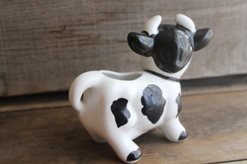 photo of vintage Japan ceramic cow creamer, black & white holstein w/ big eyelashes #3